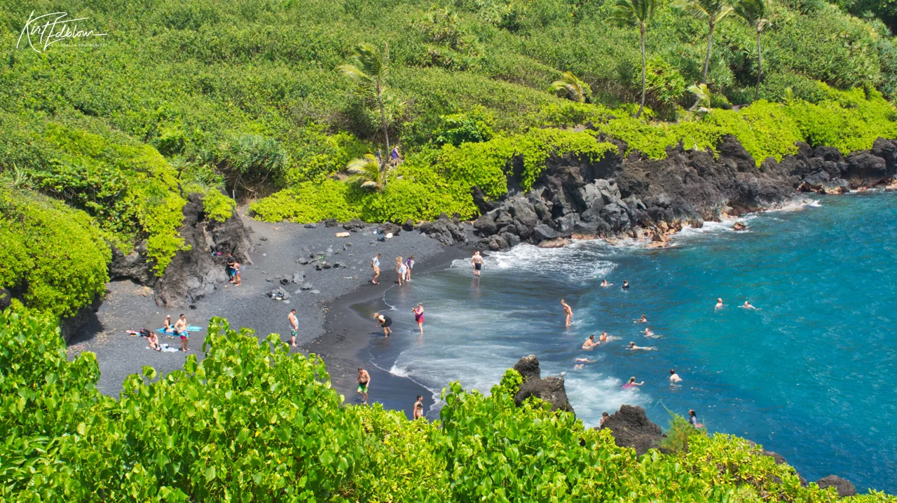 Black sand and lava coastline at Honokalani Beach in Waiʻānapanapa State Park, Maui.